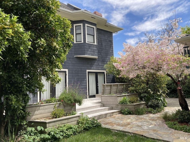view of front of property with a chimney