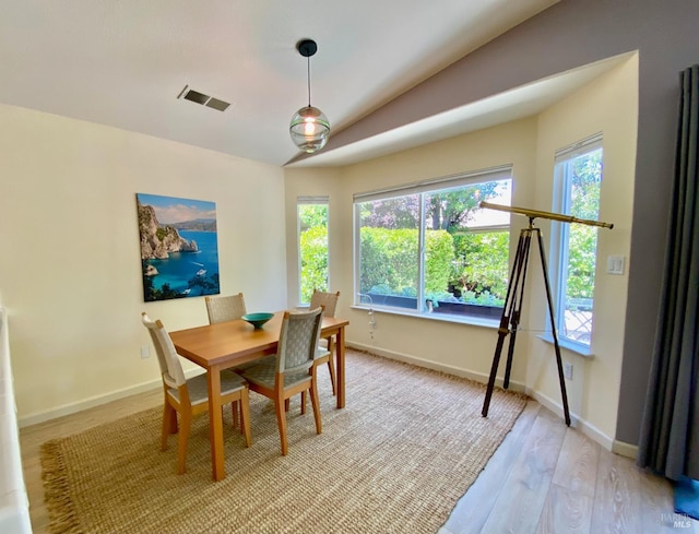 321 Riverwood Ln, Rio Vista, CA 94571 - dining space featuring vaulted ceiling, light wood finished floors, and baseboards
