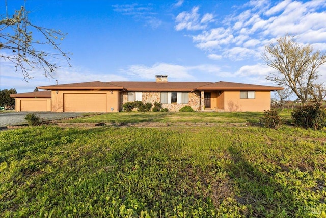 2062 Woolsey Rd, Fulton, CA 95439 - ranch-style home featuring aphalt driveway, stucco siding, a front yard, an attached garage, and a chimney