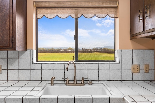 2062 Woolsey Rd, Fulton, CA 95439 - kitchen with tasteful backsplash, dark brown cabinetry, light countertops, and a sink