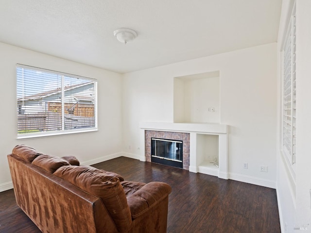 2085 Banjo Dr, Santa Rosa, CA 95407 - living area with baseboards, a tiled fireplace, and dark wood finished floors