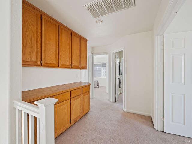 2085 Banjo Dr, Santa Rosa, CA 95407 - corridor featuring light carpet, baseboards, and visible vents