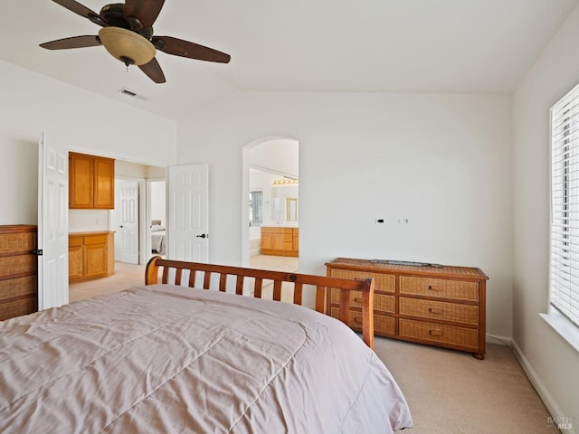 2085 Banjo Dr, Santa Rosa, CA 95407 - bedroom featuring lofted ceiling, baseboards, connected bathroom, visible vents, and light carpet