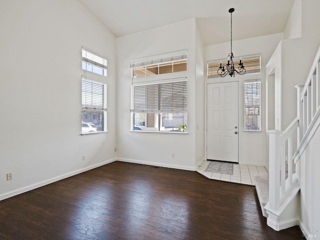 2085 Banjo Dr, Santa Rosa, CA 95407 - entrance foyer with baseboards, wood finished floors, stairway, and a chandelier