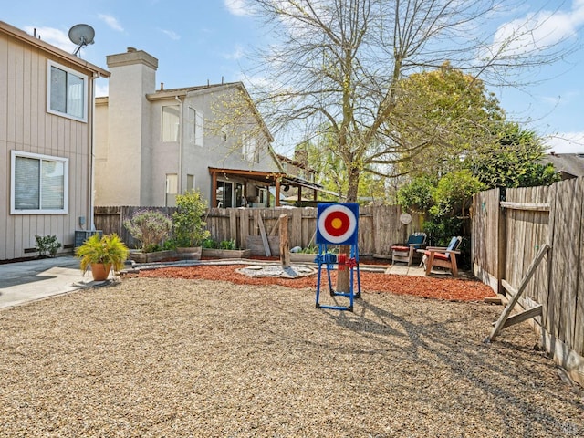 2085 Banjo Dr, Santa Rosa, CA 95407 - view of yard featuring a fenced backyard, central air condition unit, and a patio area
