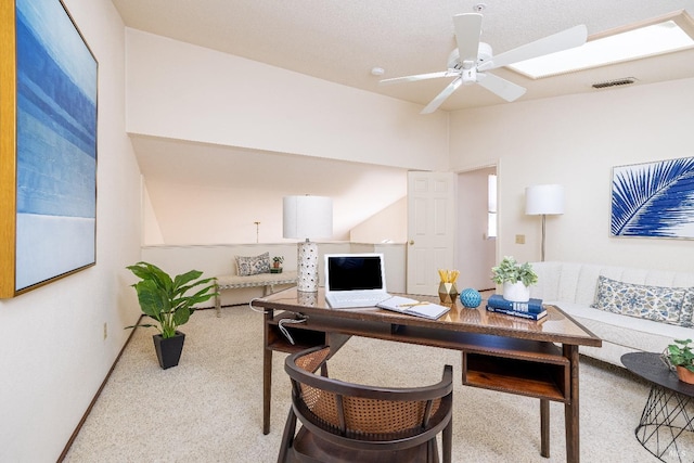 interior space with visible vents and a ceiling fan