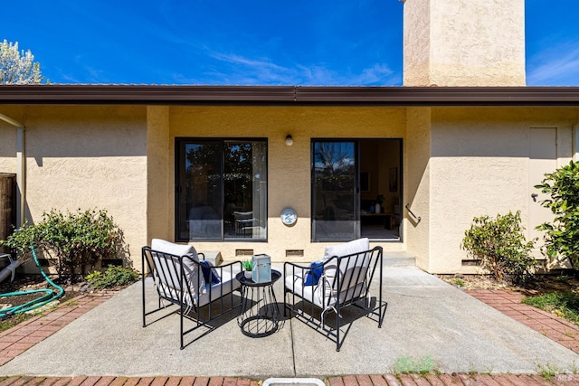 view of patio with an outdoor living space