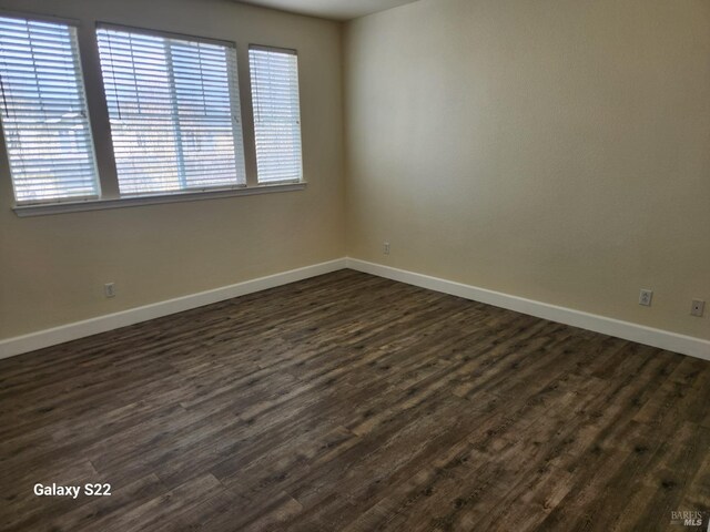 kitchen with light brown cabinets, appliances with stainless steel finishes, a sink, and light wood-style flooring