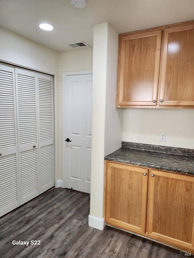 bathroom featuring a garden tub, a sink, and a shower stall