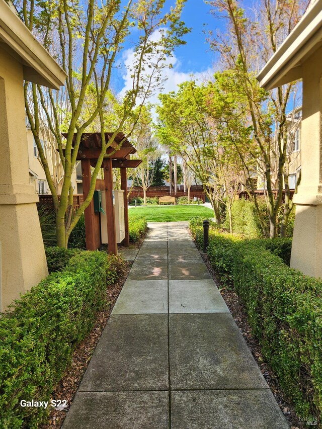 view of patio featuring fence
