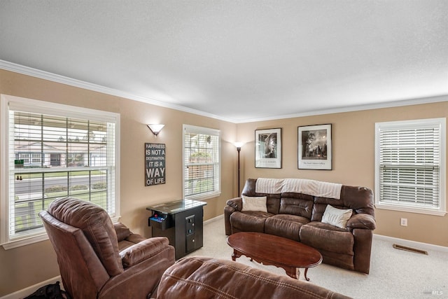 living room featuring carpet flooring, crown molding, baseboards, and visible vents