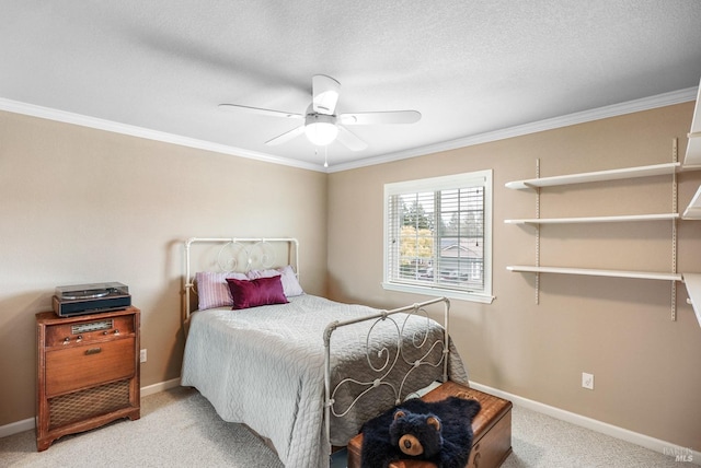 bedroom with light carpet, baseboards, crown molding, and a textured ceiling