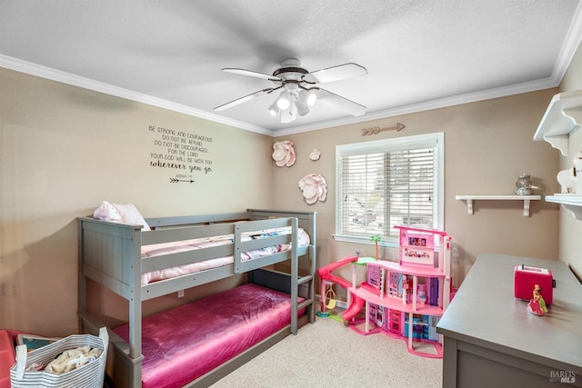bedroom with carpet floors, ceiling fan, and crown molding