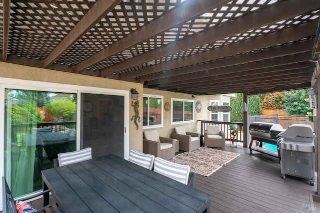 deck with fence, outdoor dining space, area for grilling, a pergola, and outdoor lounge area