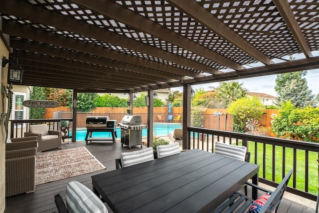 deck featuring a fenced backyard, grilling area, and outdoor dining area
