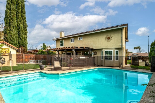 view of pool featuring a fenced in pool and fence