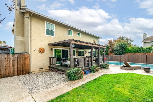 back of property featuring a fenced in pool, a fenced backyard, a pergola, stucco siding, and a yard