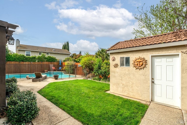 view of yard with a patio, a fenced in pool, and a fenced backyard