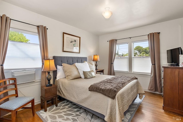 bedroom with light wood-style flooring