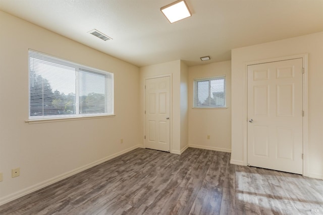334 N Main St, Ukiah, CA 95482 - unfurnished bedroom with baseboards, visible vents, and wood finished floors
