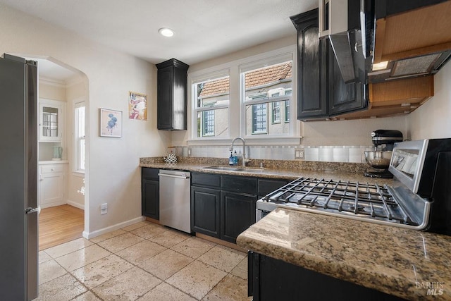 30 Buena Vista Ave, Vallejo, CA 94590 - kitchen featuring stainless steel appliances, a sink, baseboards, dark cabinets, and recessed lighting
