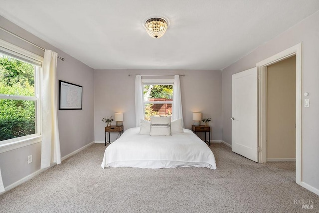 30 Buena Vista Ave, Vallejo, CA 94590 - bedroom with multiple windows, carpet floors, and baseboards