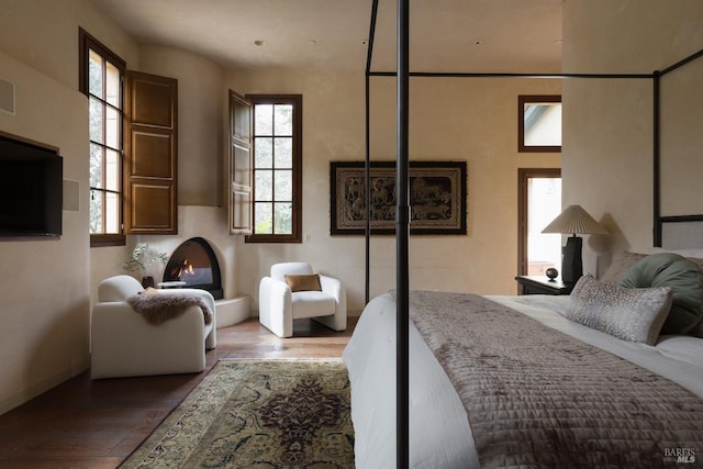 bedroom with wood finished floors