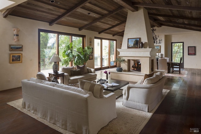 living room featuring lofted ceiling with beams, dark wood-style floors, a high end fireplace, and wooden ceiling