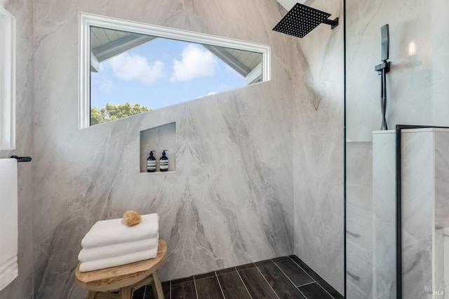 4071 Bones Rd, Sebastopol, CA 95472 - bathroom featuring a skylight, walk in shower, wood finish floors, double vanity, and a freestanding tub