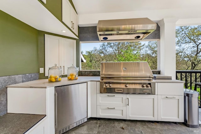 4071 Bones Rd, Sebastopol, CA 95472 - kitchen featuring white cabinets, light stone counters, and recessed lighting