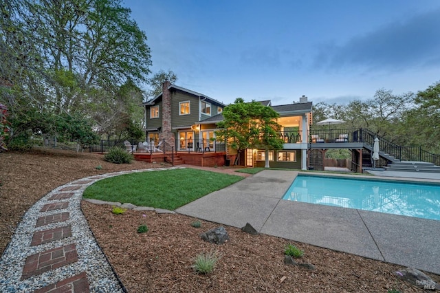 4071 Bones Rd, Sebastopol, CA 95472 - back of property featuring a chimney, a yard, a wooden deck, and a patio area