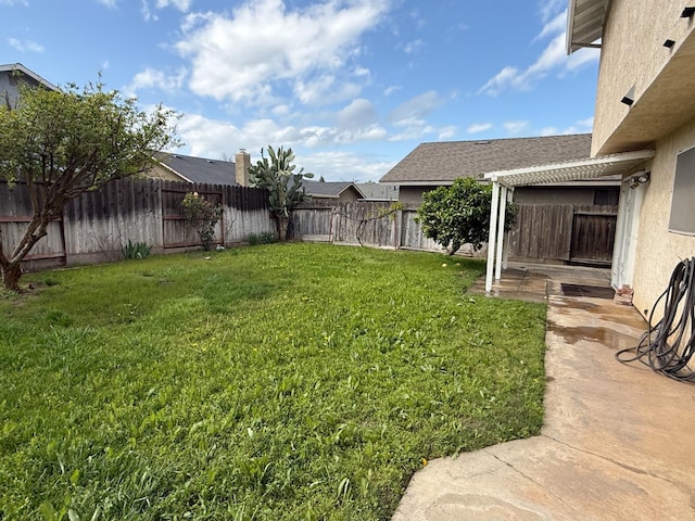 view of yard featuring a fenced backyard