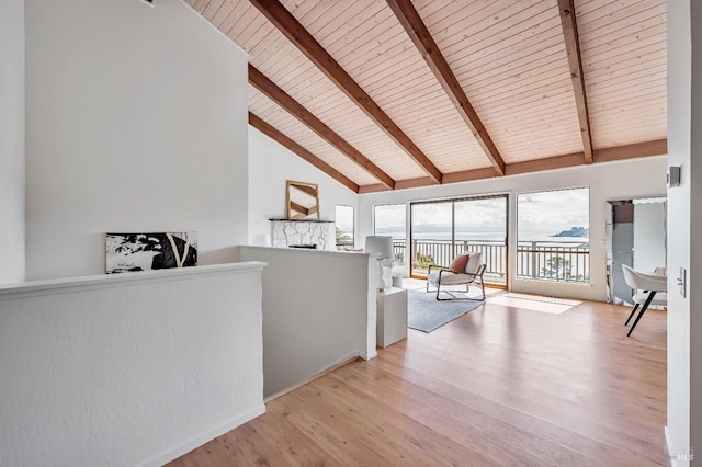 interior space with high vaulted ceiling, wooden ceiling, beam ceiling, and wood finished floors