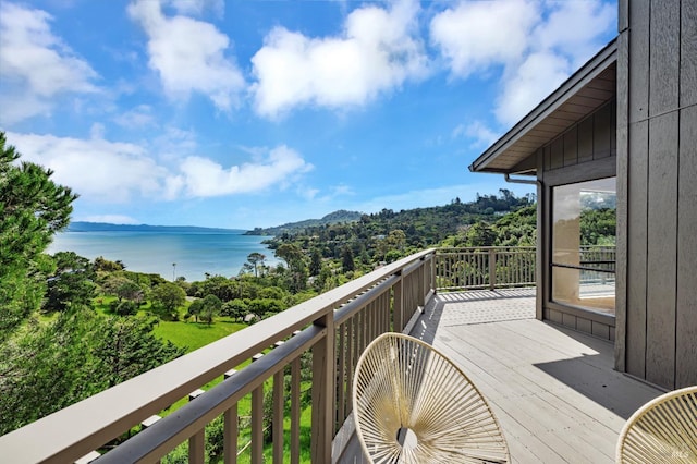 balcony featuring a water view