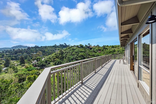 deck with a wooded view