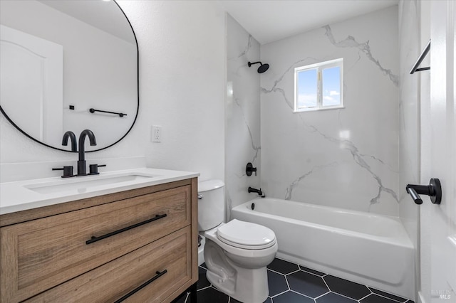 bathroom featuring toilet, vanity,  shower combination, and tile patterned flooring