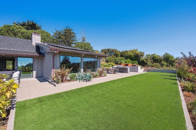 view of yard with a patio