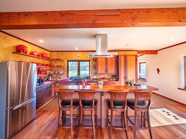 26300 Albion Ridge Rd, Albion, CA 95410 - kitchen featuring beam ceiling, open shelves, freestanding refrigerator, wood finished floors, and island exhaust hood