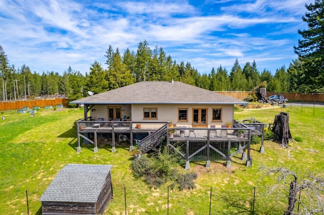 26300 Albion Ridge Rd, Albion, CA 95410 - rear view of house with stucco siding, stairs, fence, a deck, and a lawn