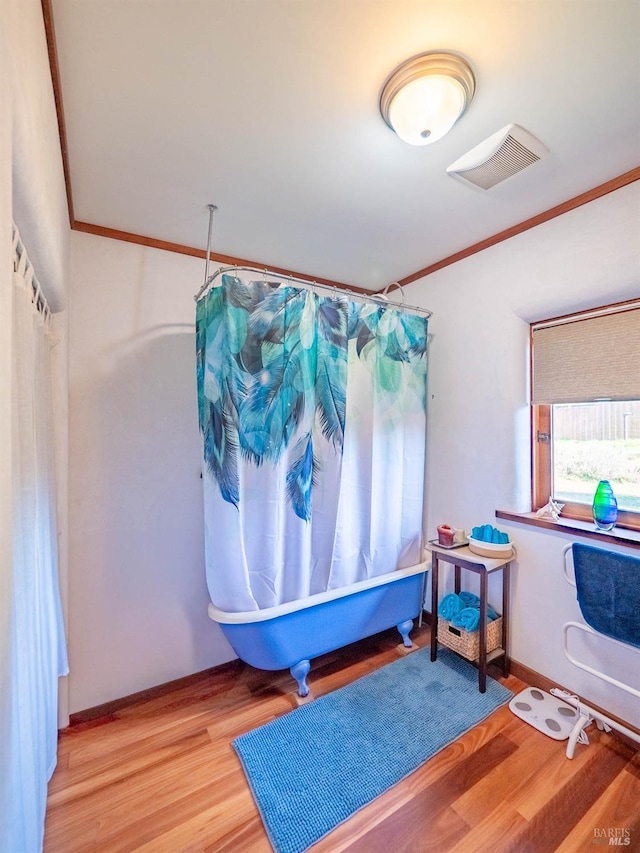 26300 Albion Ridge Rd, Albion, CA 95410 - miscellaneous room featuring baseboards, visible vents, wood finished floors, and ornamental molding