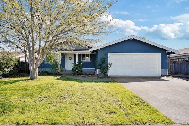 ranch-style house featuring fence, a front lawn, a garage, stucco siding, and driveway