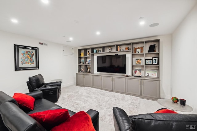carpeted living room featuring recessed lighting, baseboards, and visible vents