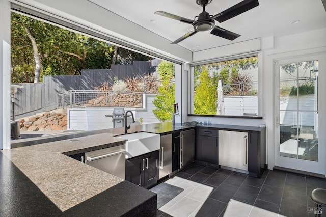sunroom with a sink