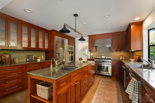 155 Hidden Valley Ln, San Anselmo, CA 94960 - kitchen with dark wood-style flooring, a sink, range hood, and premium appliances