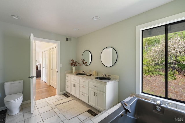 155 Hidden Valley Ln, San Anselmo, CA 94960 - full bathroom featuring double vanity, visible vents, a sink, and toilet