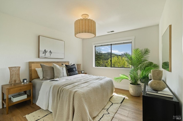 155 Hidden Valley Ln, San Anselmo, CA 94960 - bedroom featuring baseboards, visible vents, and wood finished floors
