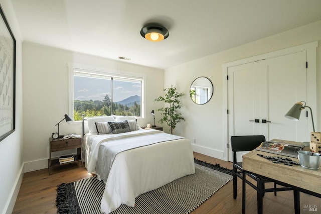 155 Hidden Valley Ln, San Anselmo, CA 94960 - bedroom featuring baseboards, visible vents, and wood finished floors