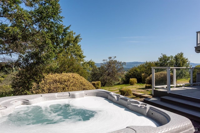 exterior space with a jacuzzi