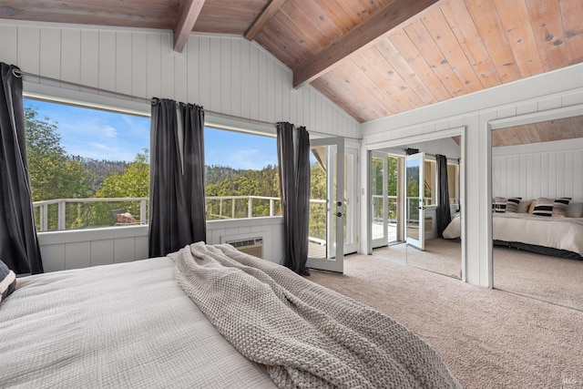 carpeted bedroom featuring vaulted ceiling with beams, wood ceiling, multiple windows, and access to exterior