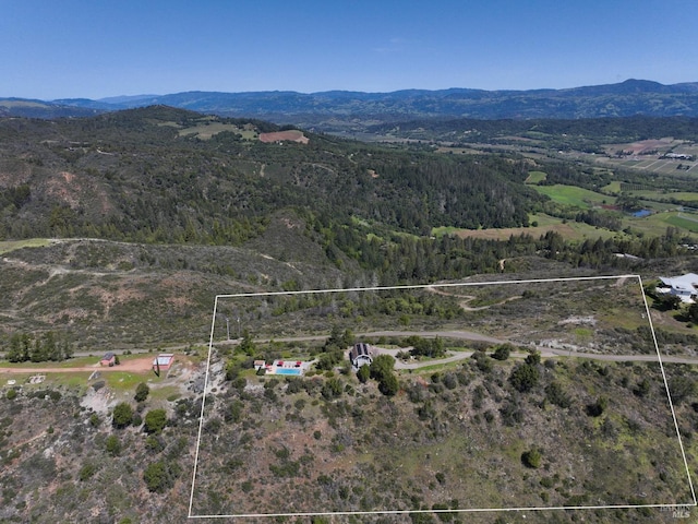 drone / aerial view with a mountain view
